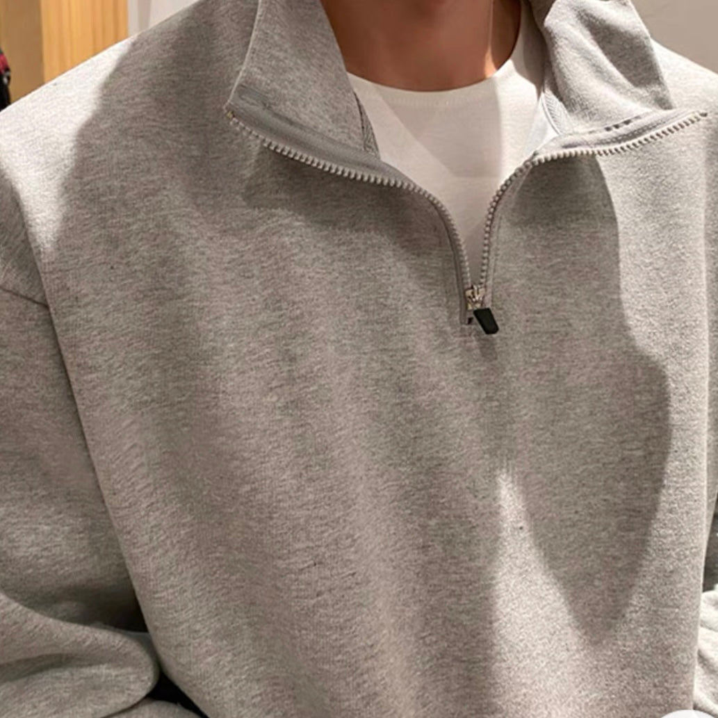 FLEECE QUARTER-ZIP SWEATER